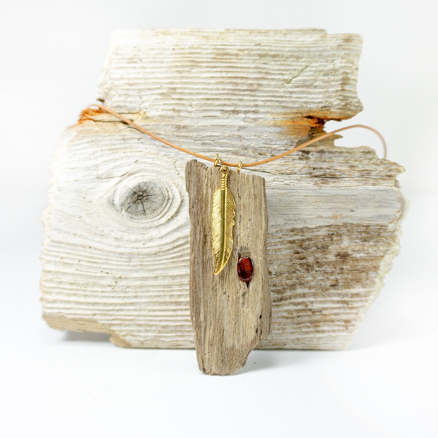 DRIFTWOOD AMBER LEATHER Necklace 'Amrum' with golden feather, sustainable jewelry