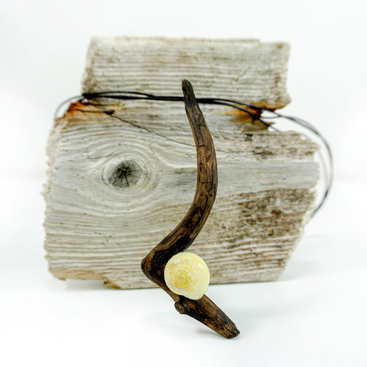 One-of-a-kind DRIFTWOOD NECKLACE 'Borkum' with yellow snail shell
