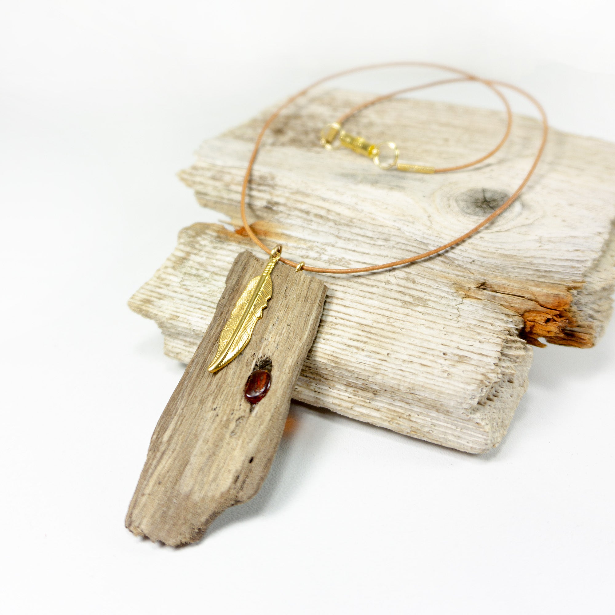 DRIFTWOOD AMBER LEATHER Necklace 'Amrum' with golden feather, sustainable jewelry