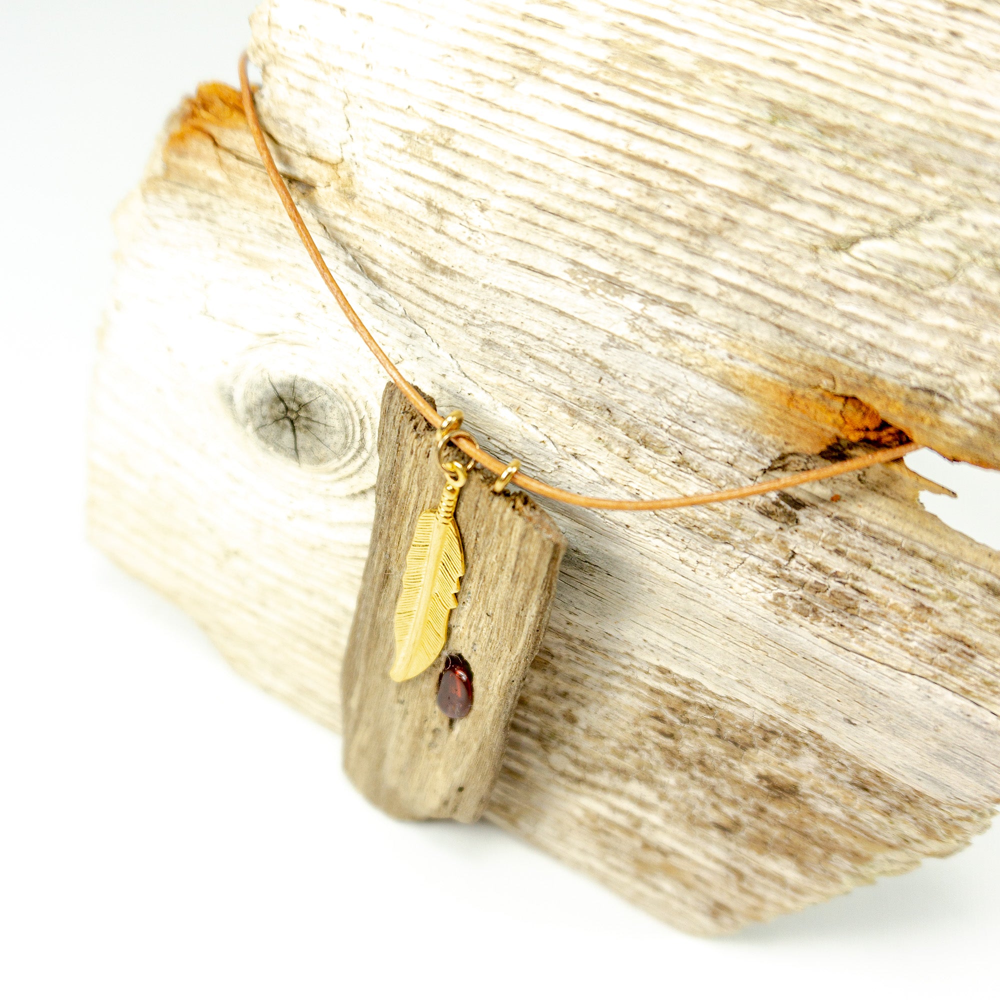 DRIFTWOOD AMBER LEATHER Necklace 'Amrum' with golden feather, sustainable jewelry