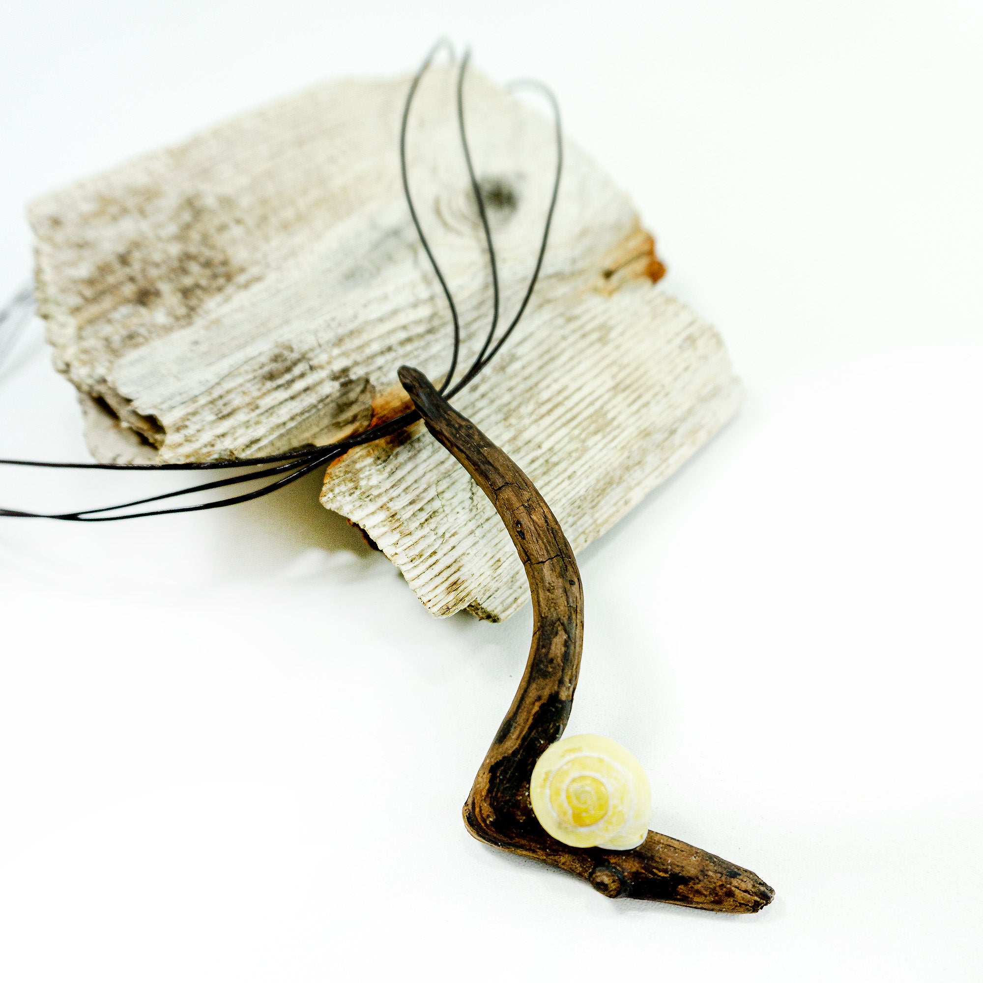 One-of-a-kind DRIFTWOOD NECKLACE 'Borkum' with yellow snail shell