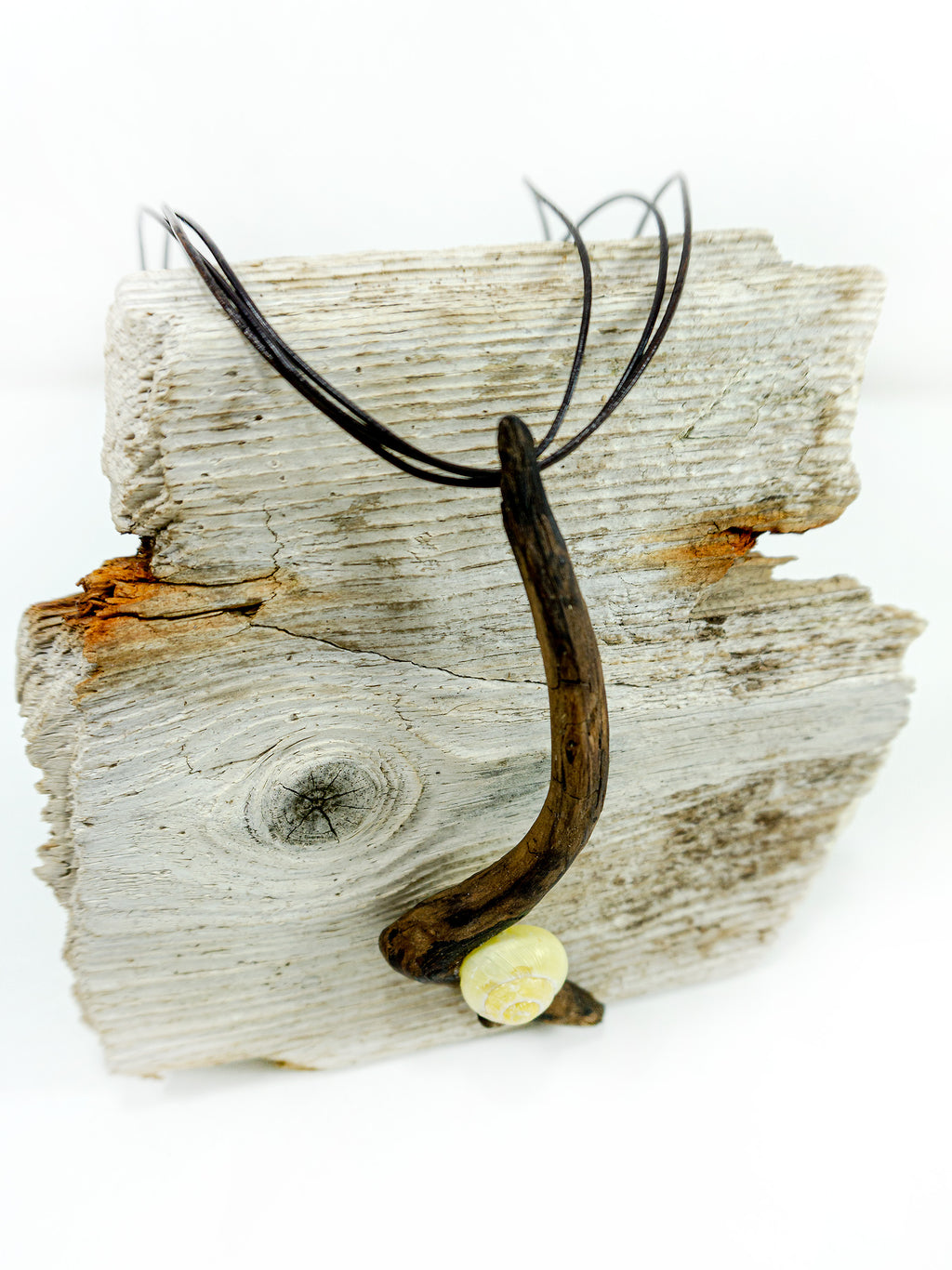 One-of-a-kind DRIFTWOOD NECKLACE 'Borkum' with yellow snail shell
